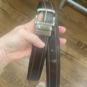 Brown leather with stitch accents. Size 38